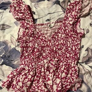 Pink and white peplum top